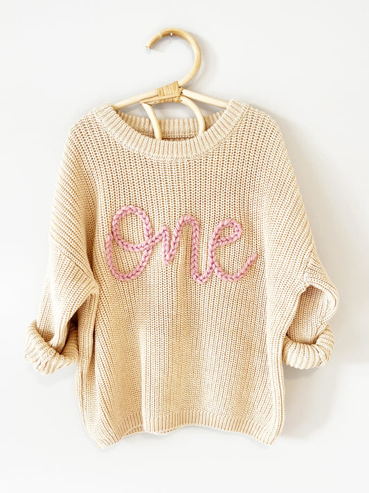 "ONE" EMBROIDERED SWEATER